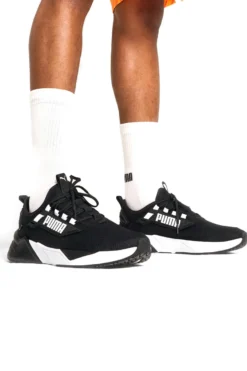 Sneakers nere comfort Puma Retaliate 3